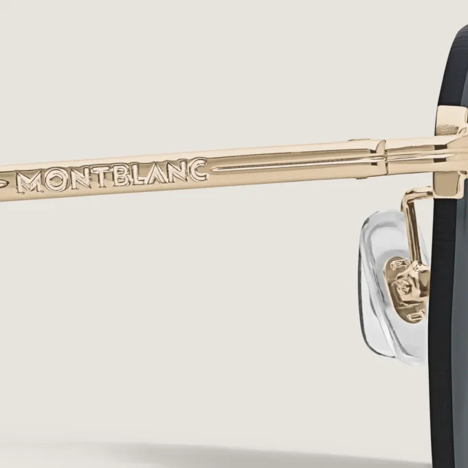 Gafas de sol redondas con montura de metal dorado